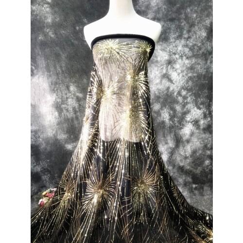 Black background gold firework net yarn see-through sequin fabric clothing performance clothing womens skirt designer fabric