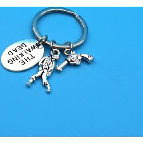 New Fashion KeychainThe Walking Dead Pendants DIY Men Jewelry Car Key Chain Ring Holder Souvenir For Gift Zombie Revolver