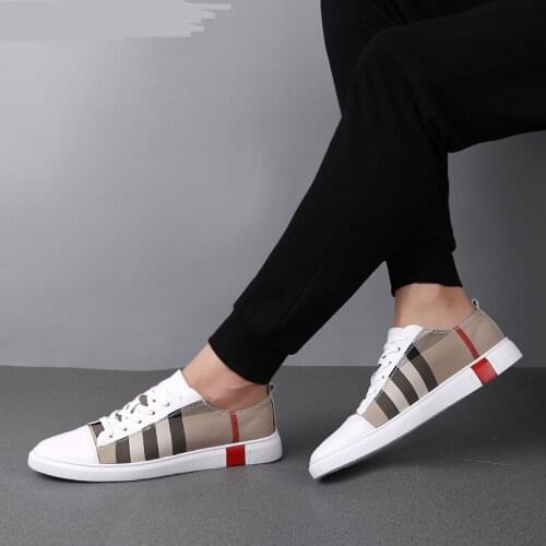 Fashion Women Mens Breathable Skateboard Shoes Men Fashion Sneakers High Quality Trainers Shoes Casual Genuine Leather Shoes