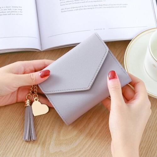Korean Short Wallet Female 2021 Spring New Mini Tassel Pendant Thin Wallet Card Holder Small Fresh Student Buckle Coin Purse