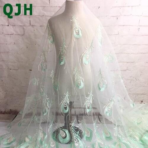 Latest 1yard African Tulle Swiss Voile Lace Fabrics White Green Peacock Feather Pattern Embroidered Skirt Cloth Dress Accessory