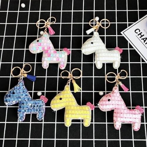 Korean car key chain mens and womens leather doll catching machine key chain bag pendant batch