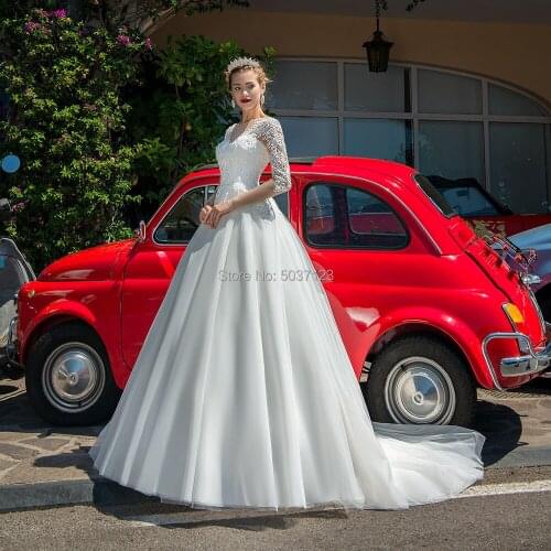 2021 Elegant Long Sleeves Wedding Dresses O Neck Lace Appliques Button Illusion A Line Vestido De Noiva Bridal Gown Court Train