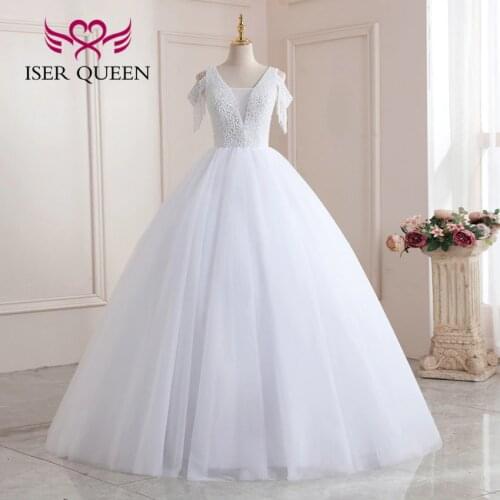 Heavy Small Pearls Beading Top White Wedding Dress 2021 Special Cap Sleeve Tassel Tulle Wedding Gown V neck Bride Dresses WX0204