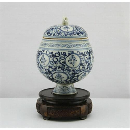 The ancient Chinese hand-painted blue and white porcelain tea pot