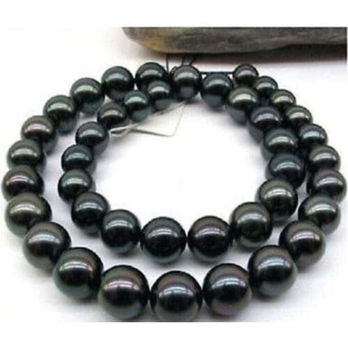 Stunning 12mm round tahitian black pearl necklace 18"