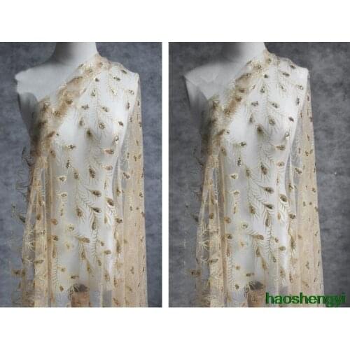 Spangled gold feathers, floral sequins, embroidered fabric, see-through mesh gown dress fashion dress