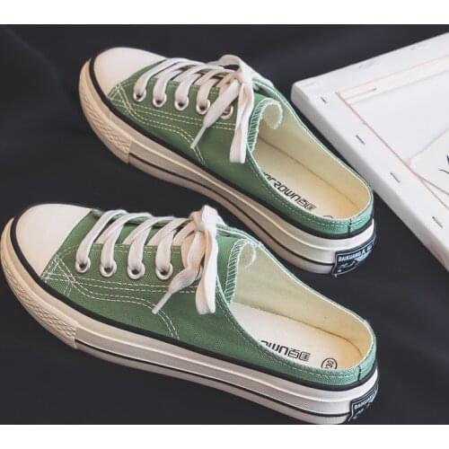 2021 summer new heel less canvas shoes womens half slippers Korean versatile flat bottomed small dirty orange shoes