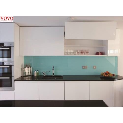 White glossy kitchen cabinet handless