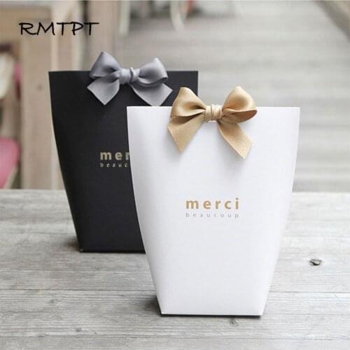 RMTPT Large 20pcs/lot Upscale Kraft Papel "Merci" Gift bag Wedding Favors Candy Bag Package Birthday Party Favor Boxes