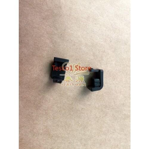 Origina lFor Nikon D3400 battery cover next to the leather case