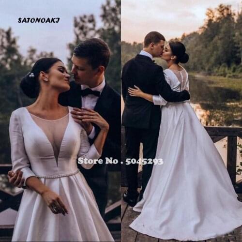 Elegant 2020 Wedding Dress for Women Sheer Scoop 3/4 Sleeves Illusion Buttons Back Pearl Beaded Bridal Gowns Vestidos Undefined