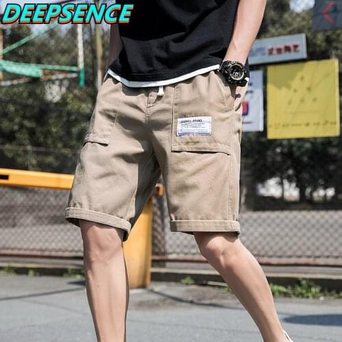 2021 Spring Summer New Fashion Casual Cargo Shorts Men Korean Drawstring Solid Pockets Loose Fit Knee Length Shorts Men