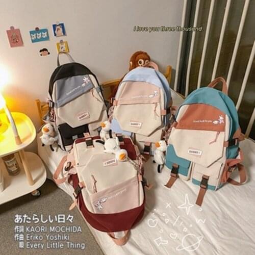 Japanese college style backpack girl soft girl stitching school bag Korean version cute art and color contrast backpack 2021