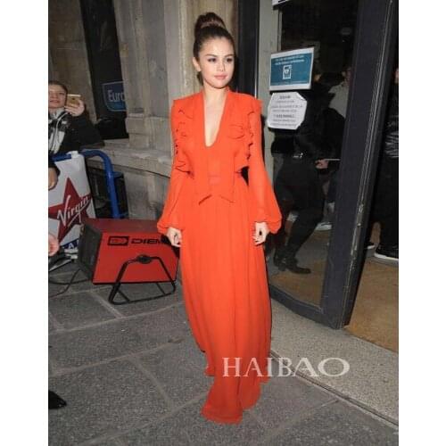 Europe and the United States 2019 new sexy V-neck lanterns sleeves orange temperament elegant swing beach dress