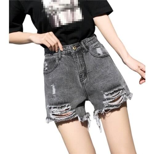 ZG1202 2020 summer new women fashion High waist slim rough edge wide leg ripped loose irregular denim shorts cheap wholesale