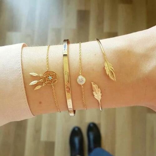 Hot sale bohemian suit bracelet with alloy crystal geometric arrow leaf bracelet four-piece for modern women gifts wholesale