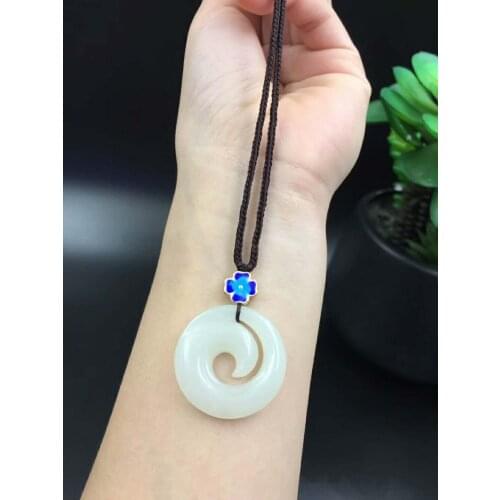 Hetian jade auspicious peace reincarnation luck lucky grass boutique The path winds along mountain ridges. Cloisonne jewelry