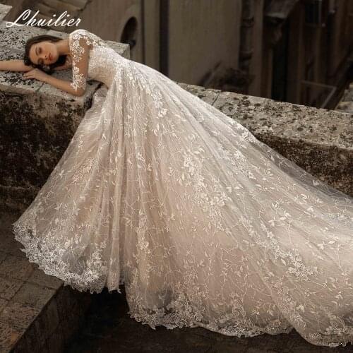 Lhuilier Elegant A-line Half Sleeves Lace Wedding Dresses 2020 Empire Waist Floor Length Chapel Train Bridal Dress
