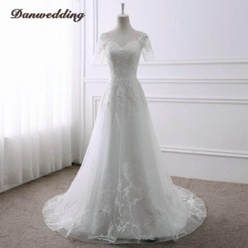Junoesque A-Line Wedding Dress Scalloped Neck Short Sleeve Refinement Lace Applique Bridal Dress With Illusion Back Real Photo