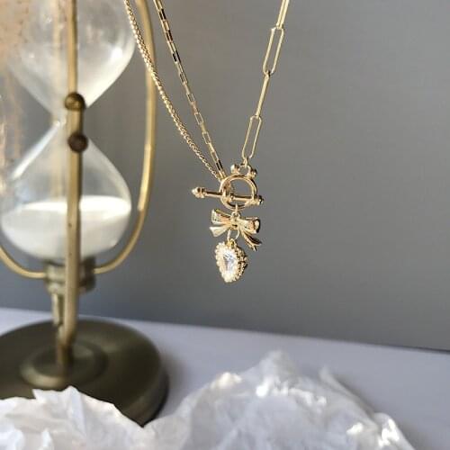 Silvology 925 Sterling Silver Bling Zircon Bowknot Heart Necklace for Women Asymmetry Chain Temperament Necklace Luxury Jewelry