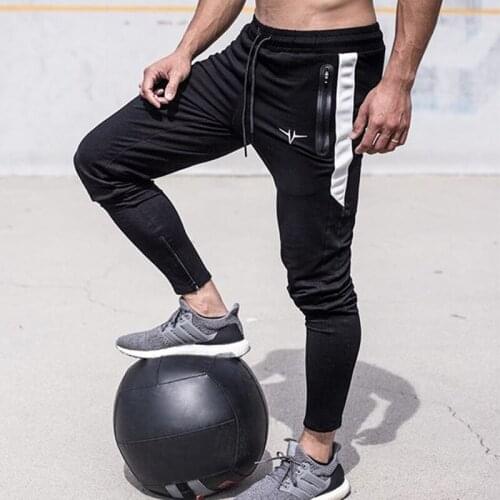 2021 spring and autumn new casual slim trouser pockets zipper and drawstring sports plus size mens casual pants trousers