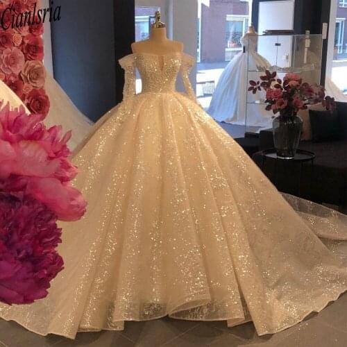 2021 Glitter Ivory Pearls Wedding Dresses Sequins Beaded Ball Gown Church Bridal Gowns Long Sleeves Extra Puffy