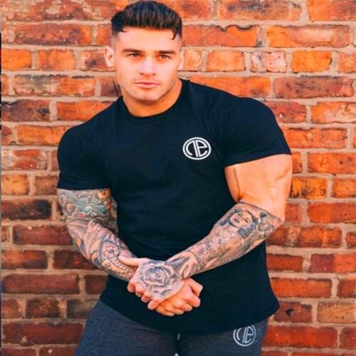 2018 HETUAF Brand Compression Shirt Short Sleeves T-shirt Gyms Fitness Clothing Solid Color fashion Casual Lycra Tops