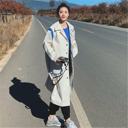 2021 new early autumn design sense senior casual white tooling single-breasted windbreaker womens mid-length fashion coat