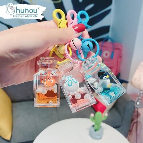 Cute Moving Floating Quicksand Fish Dolphin Liquid Keychain For Women Girl Backpack Car Keychain Ring Creative Bottle Keychains