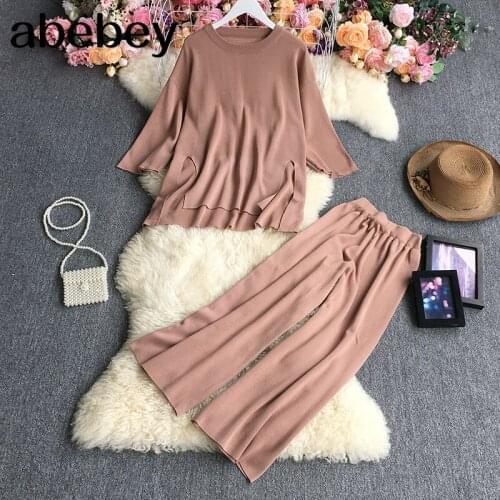2021 New Spring Autumn Fashion O-neck long sleeve knitted split Top + high waist solid loose casual wide leg Pants two-piece set