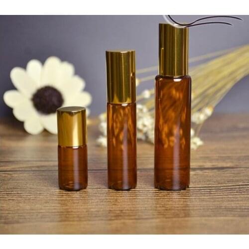 Free shipping 2.5/5/10ml 10pcs/lot brown glass steel ball roll on bottle,essential oil subpackage empty bottle with golden lid