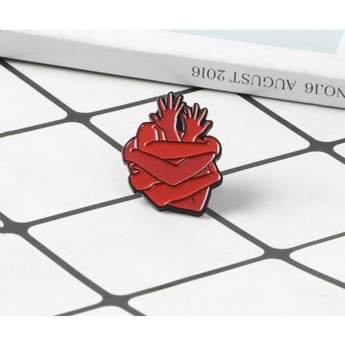Anatomy Organ Heart Pin Hand Hug Heart Brooch Red Human Heart and Hand Enamel Pin Badge Art Jewelry Gift for Women Men Brooches