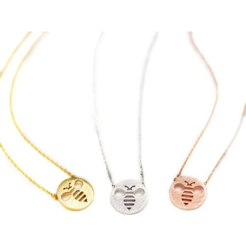 Fashion bees pendant necklaces Lovely circle hollow out the bees pendant necklaces The bee shadow charm necklaces