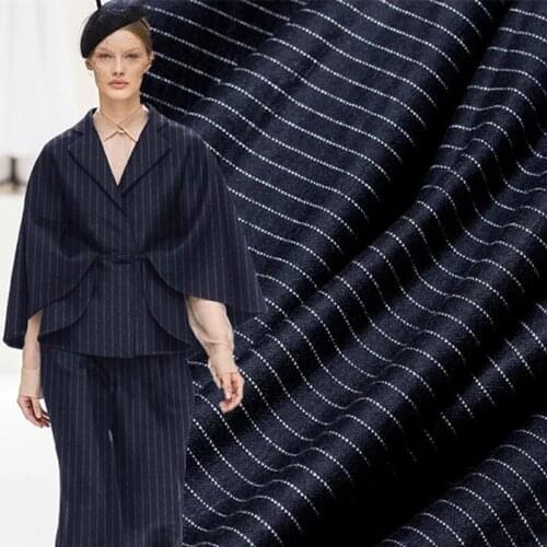The cloth Navy blue white line High Gloss knitted wool elastic garment materials Autumn pants DIY clothes fabrics