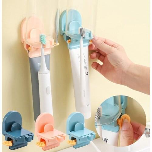 Multifunctional toothpaste squeezer wall-mounted free punch bathroom storage rack household bathroom toilet cup finishing rack