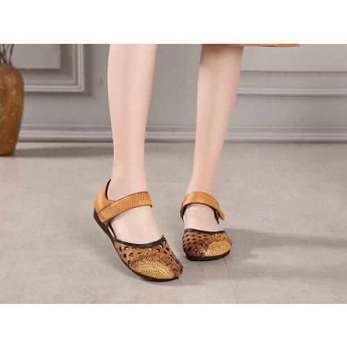 Ethnic style leather hollow sandalsIndividual Leisure Comfortable Printed Flat-soled Womens Shoes