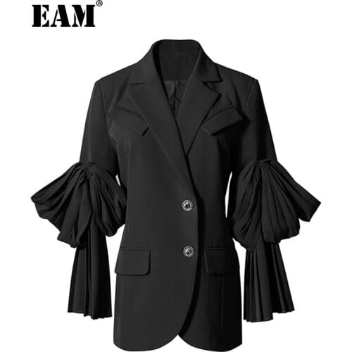 [EAM] Women Black Pleated Irregular Blazer New Lapel Long Flare Sleeve Loose Fit Jacket Fashion Spring Autumn 2021 1DD6071