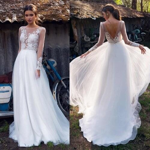 2020 A Line Wedding Dresses O-Neck Lace Appliques Bridal Gowns Long Sleeves Sexy Backless Sweep Train Beach Wedding Dress