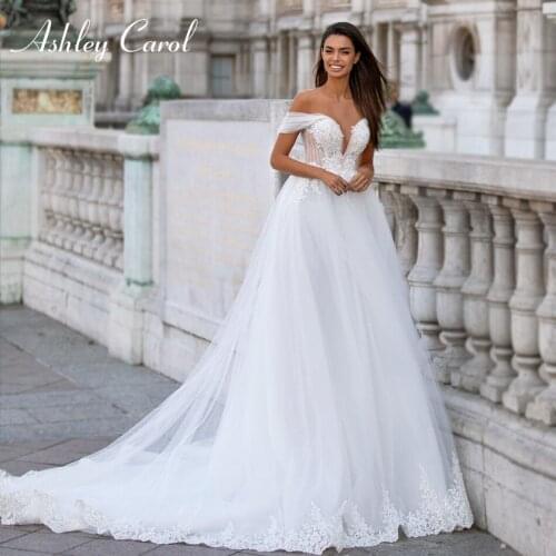 Ashley Carol A-Line Wedding Dress 2021 Charming Sweetheart Beading Lace Appliques Bride Button Cap Sleeve Princess Bridal Gown