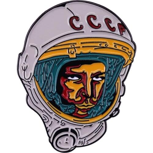 Soviet CCCP Astronaut Badge He is the Soviet cosmonaut and first man in space, Yuri Gagarin, wearing a spacesuit