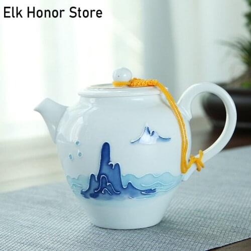 175ml White Ceramic Teapot Personal Handmade Relief Tea Set Porcelain Teapot Ball Hole Filter Puer Tea Kettle Office Decoration