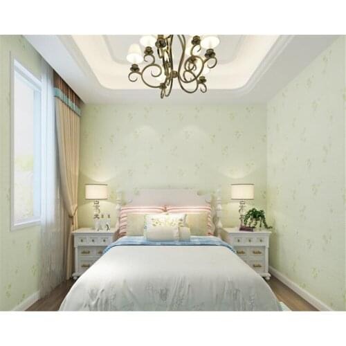 Beibehang Childrens room wallpaper warm and elegant solid color small flower non-woven bedroom background floral wallpaper