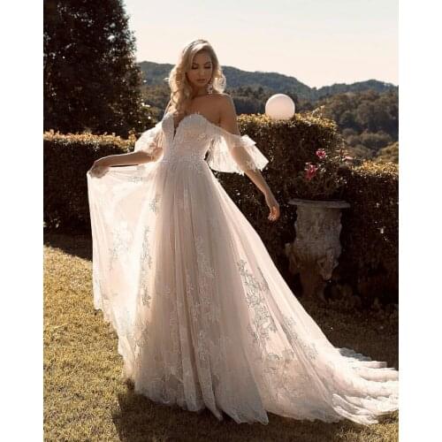 Bohemian Wedding Dress A-Line Off The Shoulder Lace Appliques Sequins Tulle Backless Sweep Train Bride Gown Vestidos De Noiva