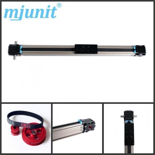 Mechanical linear unit with external roller guides, driven by an internal, completely covered toothed belt
