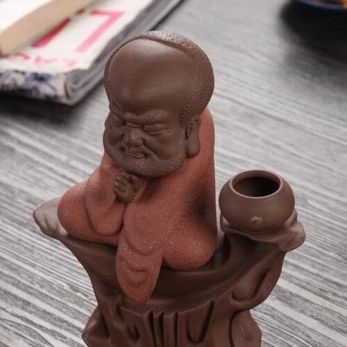 Creative color sand clay dharma characters Back in the smoke incense burner Tower incense cone Teachers of pottery and porcelain