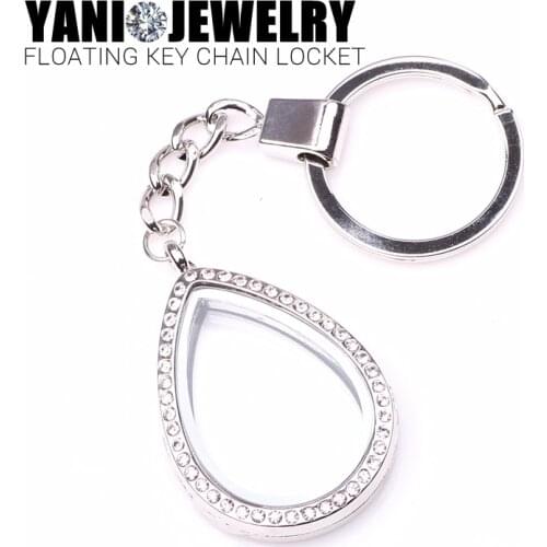 10pcs/lot Free shipping Water Drop Oval Silver Locket With Keychains Crystal Magnetic Glass Living Memory Floating Locket