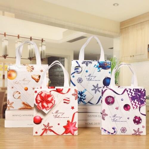 12Pcs Non-woven Fabric Christmas Printed Gift Bag Clothing Packaging Shopping Candy Bag with Hand adornos de navidad