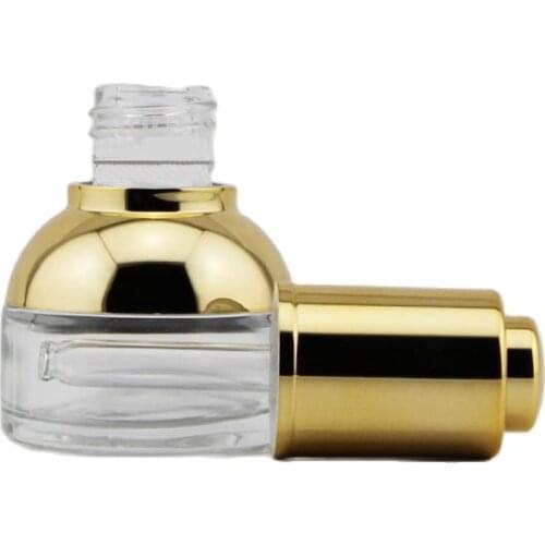 NEW ARRIVAL 20ml transparent glass dropper bottle with GOLD shoulder and GOLD press dropper ,white bulb glass bottle