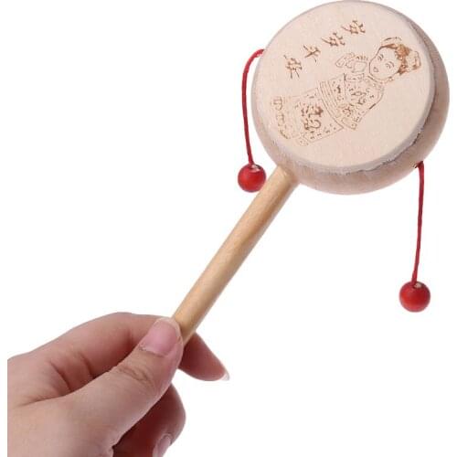 Wood Cartoon Chinese Traditional Spinning Rattle Drum Hand Bell Baby Musical Toy C5AF